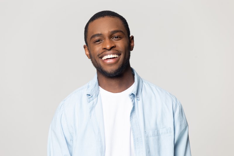 Patient smiling after teeth whitening